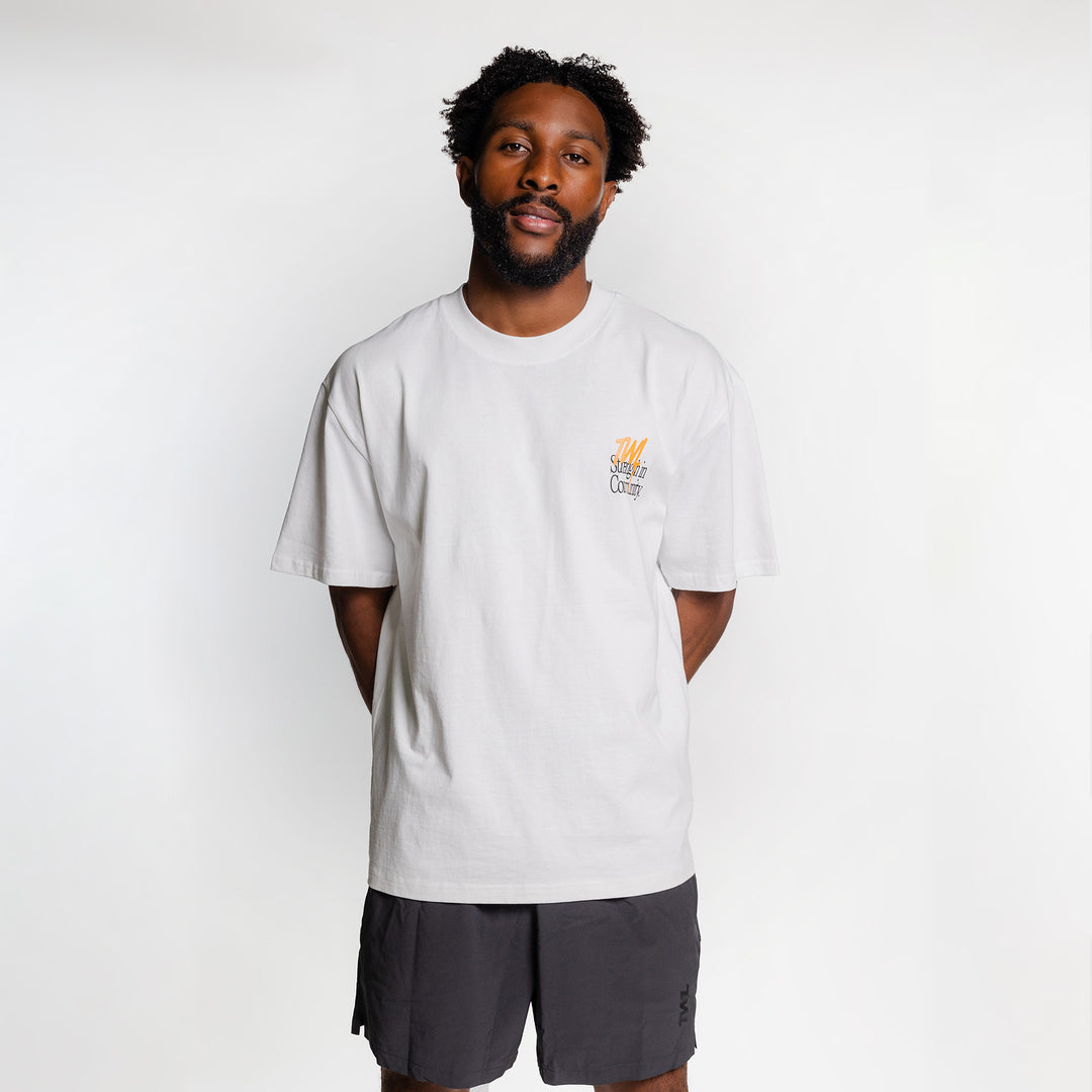 TWL - LIFESTYLE OVERSIZE T-SHIRT - STRENGTH IN COMMUNITY - FADED WHITE/ORANGE